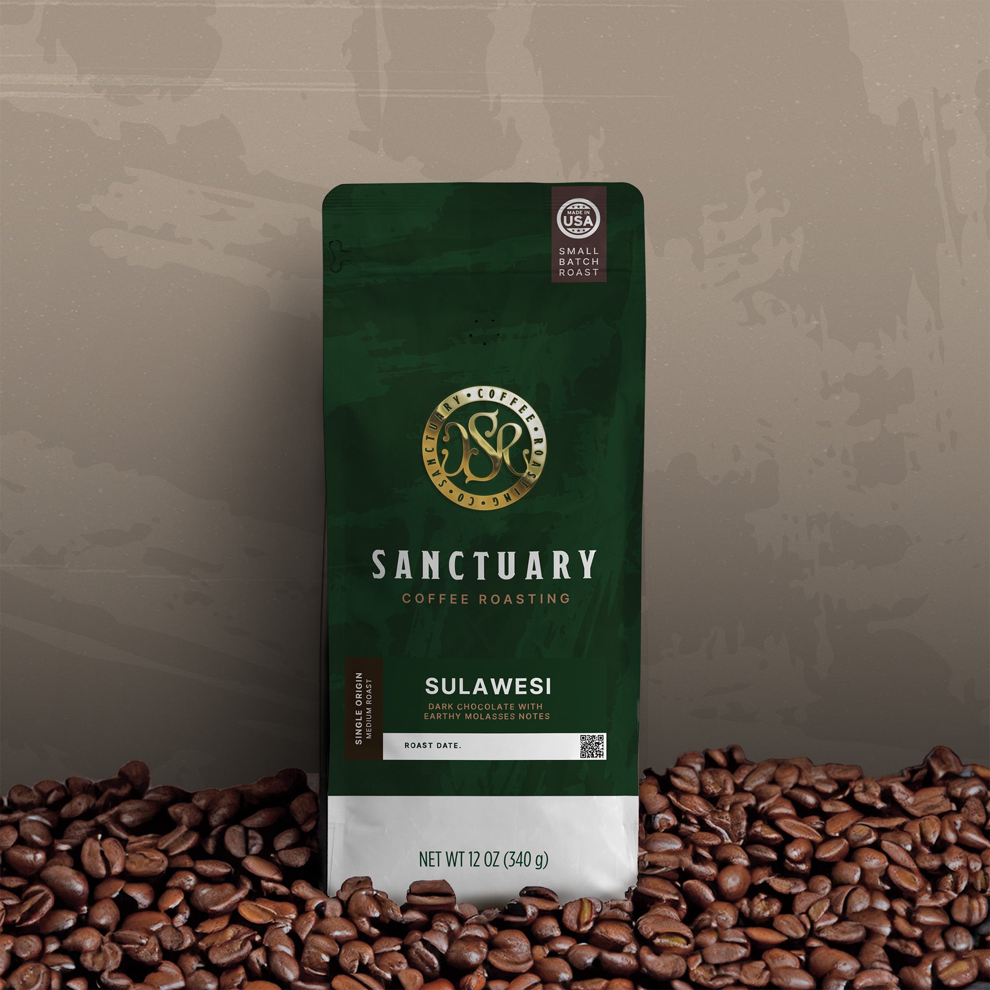 Sanctuary Coffee Roasting Sulawesi coffee bag, 12oz, medium roast, with roasted coffee beans.